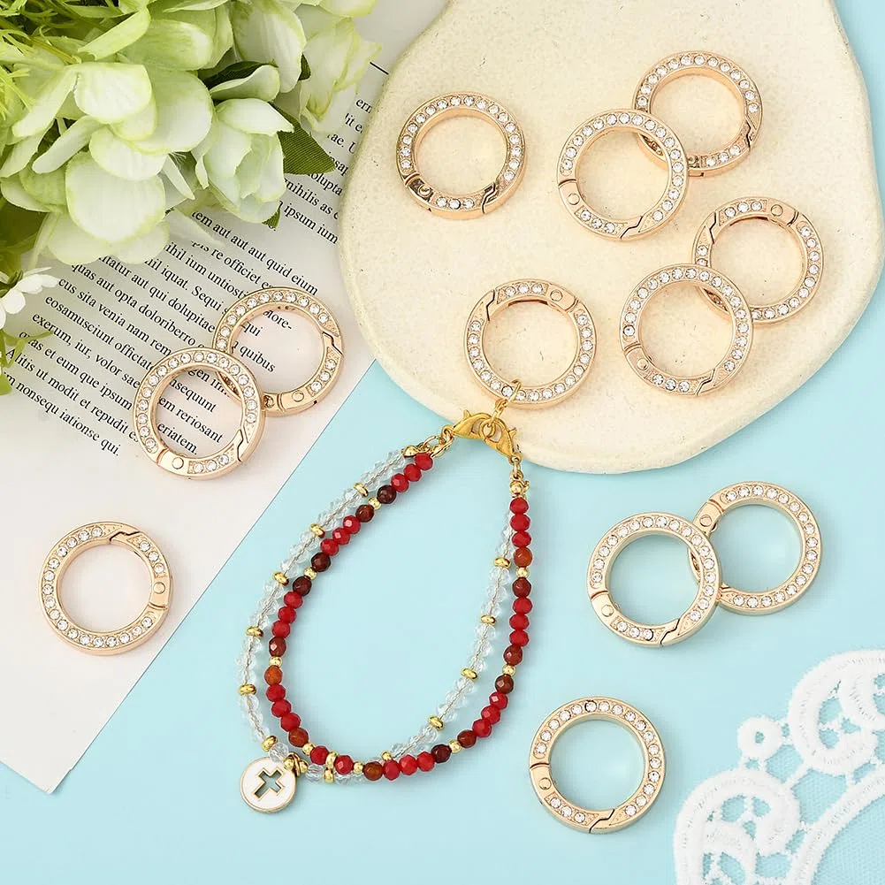 1 scatola Da 16 pezzi Da 28mm con Molla In Oro Anelli Portachiavi con Strass Anello Elastico Rotondo Piccolo Moschettone In Metlega Ganci per Portachiavi per La Creazione di Gioielli Accessor